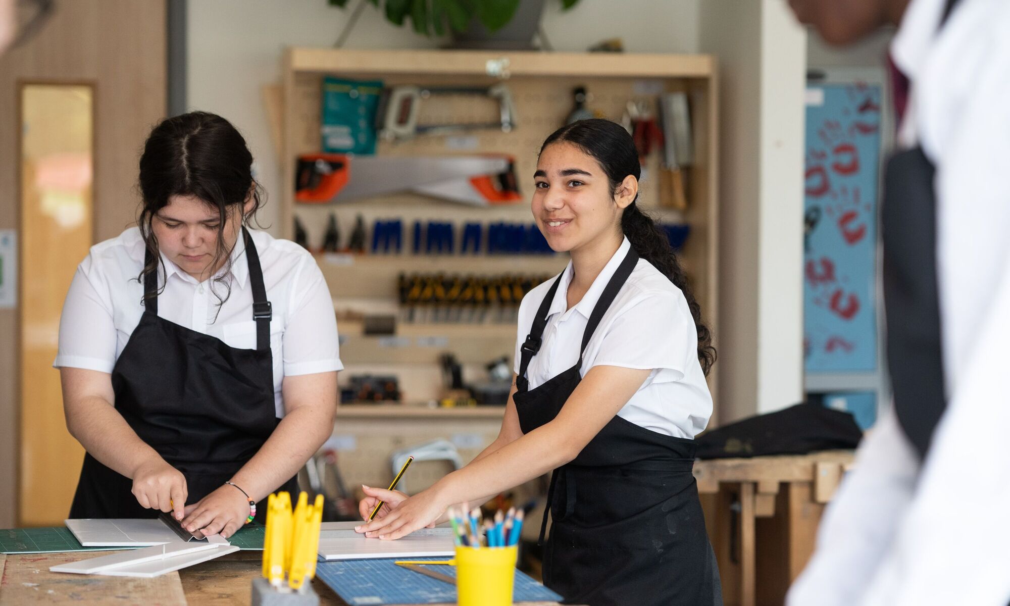 Two female students in dt room