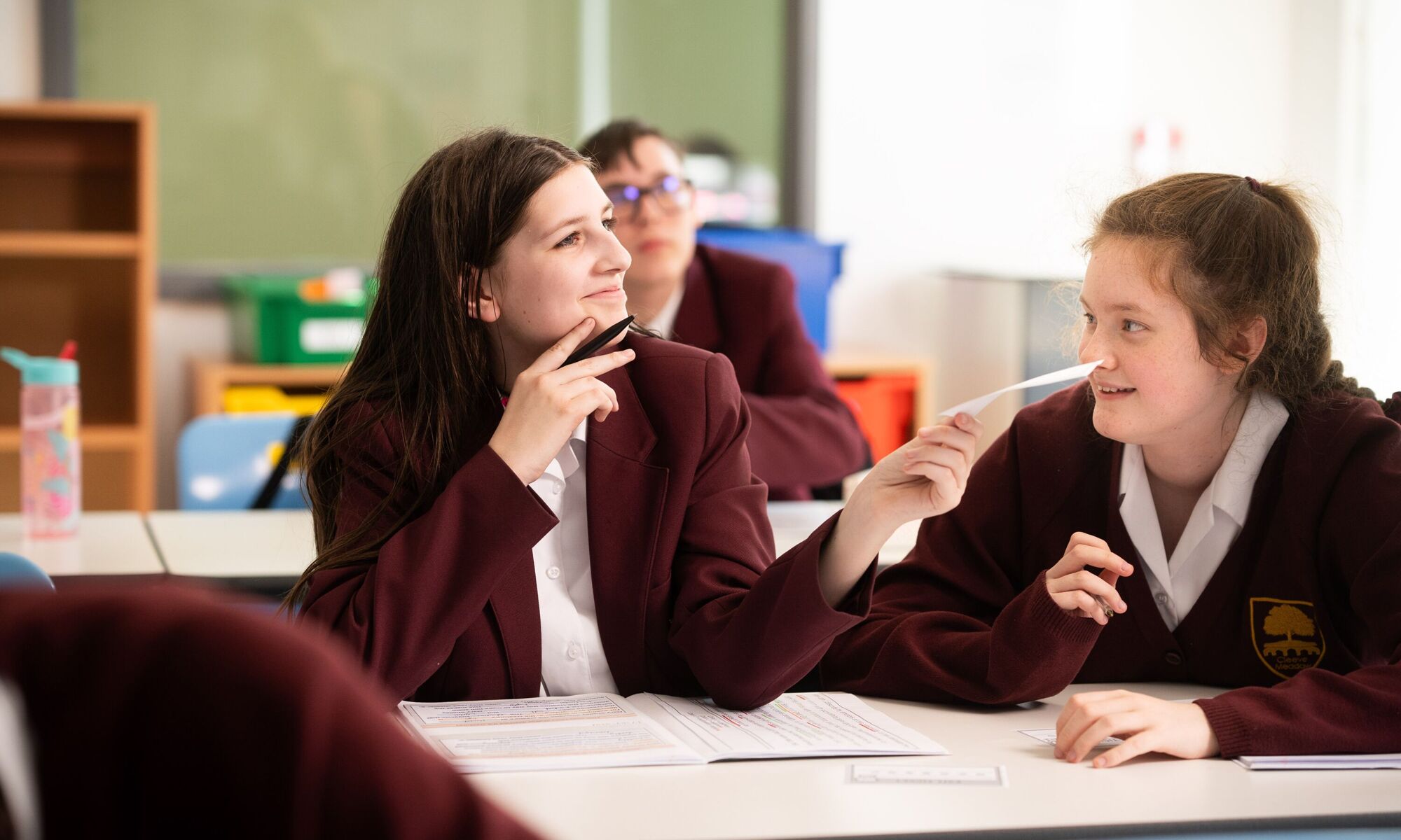 Female students sat at desk